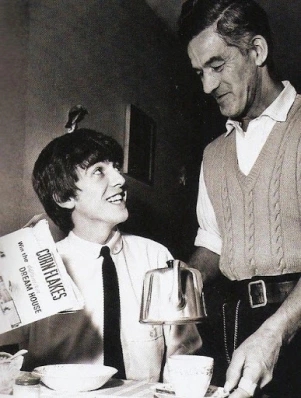 George con su padre Harold Harrison